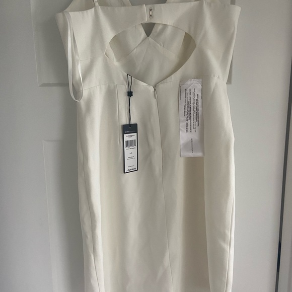 Bcbg cocktail dress. White with sequin details along the top. Cocktail - Picture 2 of 3